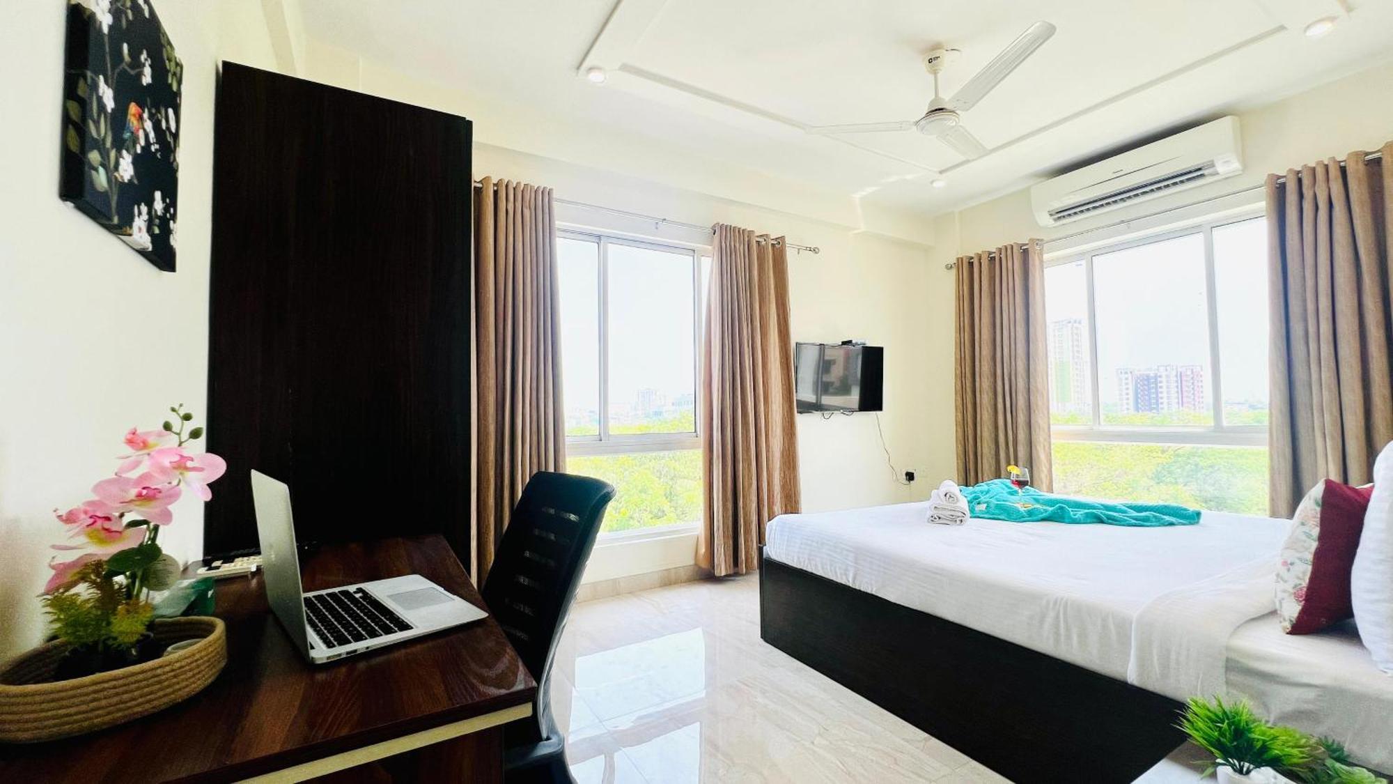 Bluo Facing 1bhk Newtown, Terrace Garden, Gym *